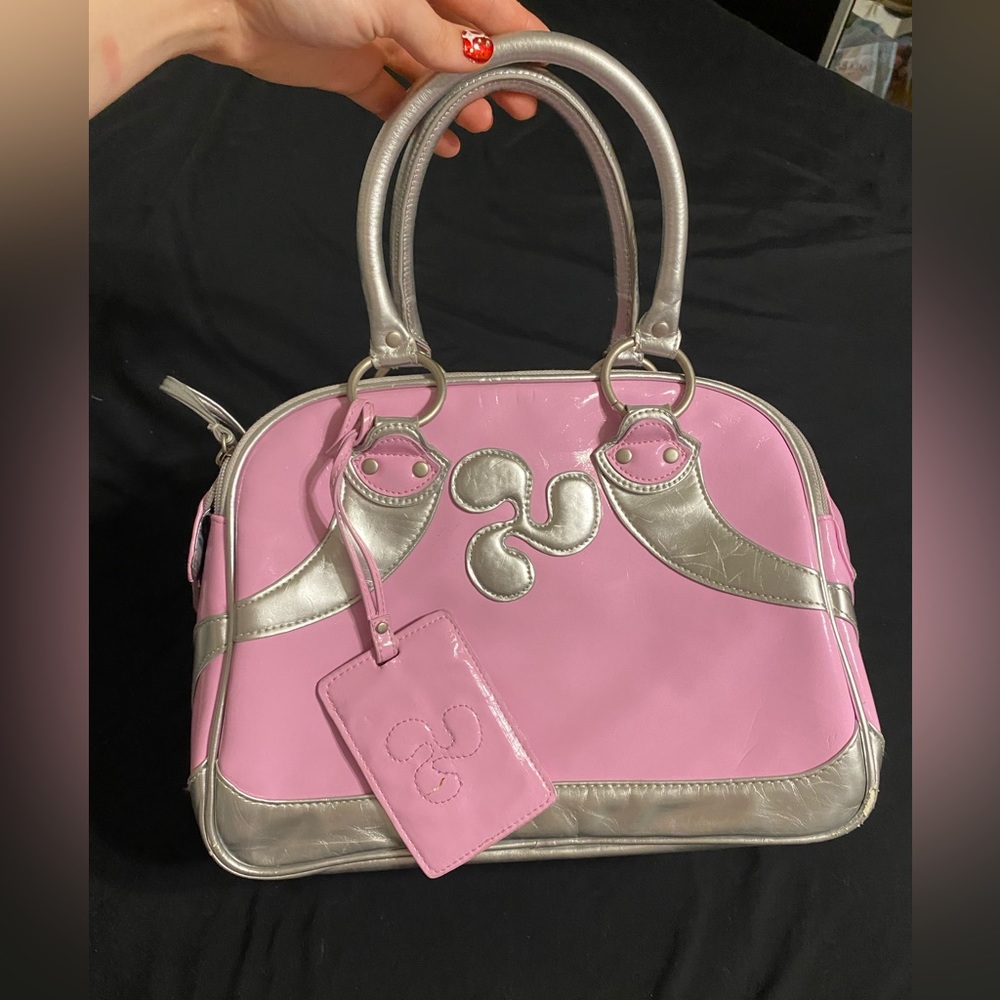 2000s Triple Flip pink and silver bowler bag.